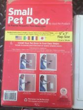 Ideal Pet Products Small Pet Flap Dog Door Cat Door 5x7 Inch Never Installed.